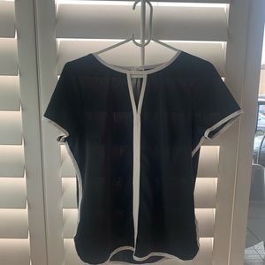 Black work blouse with white accent